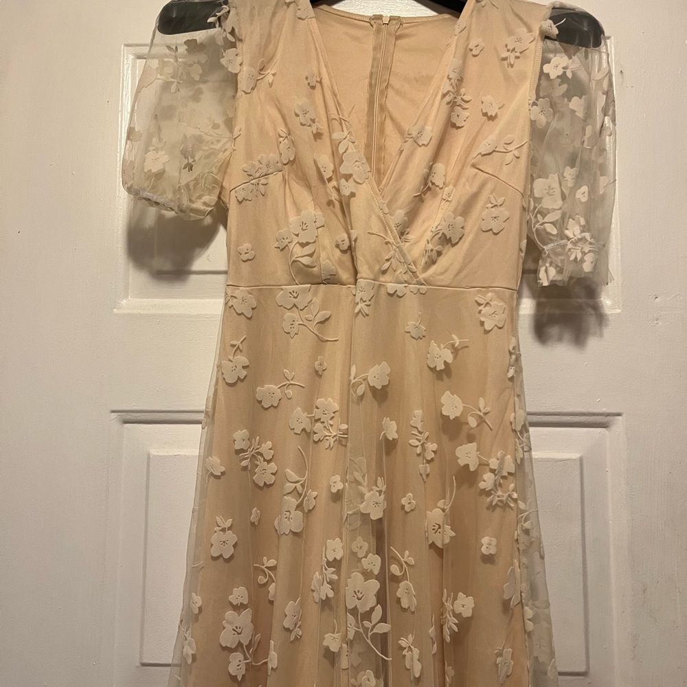 - A elegant floral mesh dress